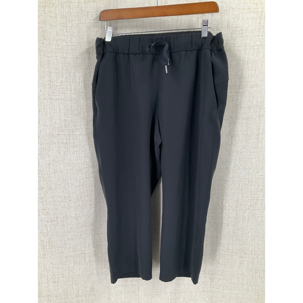 Lululemon On the Fly Pant Women 10 Black Luxtreme Minimalist Travel Athleisure